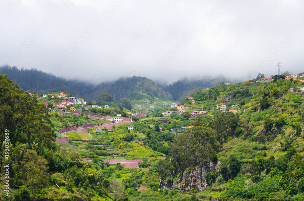 Poster Hills covered by clouds, Madeira island - Portugal