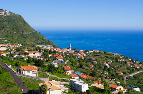 Village, church and ocean, Madeira, Portugal