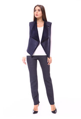 portrait of an attractive business lady woman executor in lether vest full body portrait isolated...