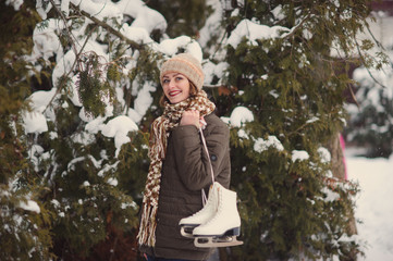 the girl on the figured skates on a opened skating rink
