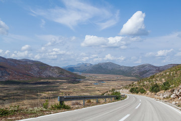 View of the road in the valley between the mountains. Montenegro. 