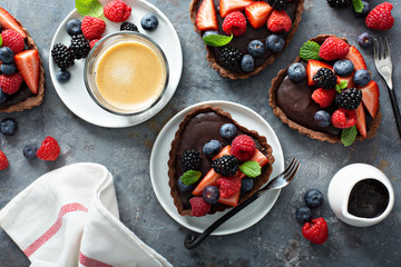 Chocolate ganache tarts with fresh berries