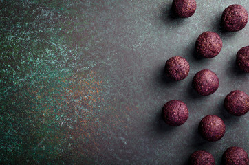 Raw energy balls with acai powder and matcha tea powder