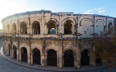 Fototapeta na wymiar Ancient Roman amphitheater arena in Nimes, France