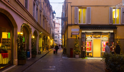 Fototapeta na wymiar New Year's illumination streets of Parma city at evening