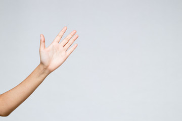 A hand counting number five isolated on white background.