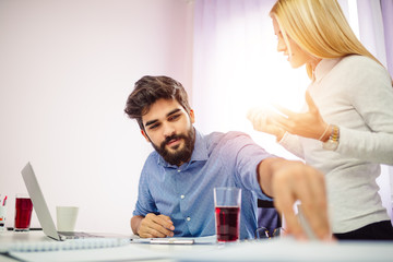 Business people working together in office.