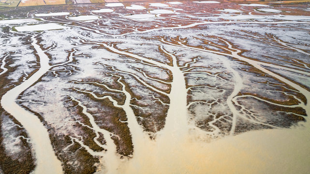 Drone view of a spectacular delta where a river flows into the sea