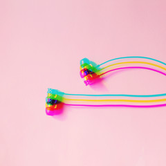 headphones. minimalism. glitch. pastel color. pink.