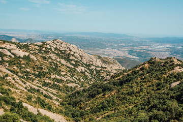 A mountain view with monastery on the top in Montserrat, Spain