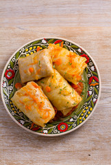 Cabbage rolls with beef, rice and vegetables. Stuffed cabbage leaves with meat. Dolma, sarma, sarmale, golubtsy or golabki. View from above, top, vertical