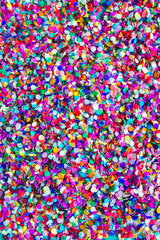 Lot of small round colorful confetti made of paper. Festive bright background
