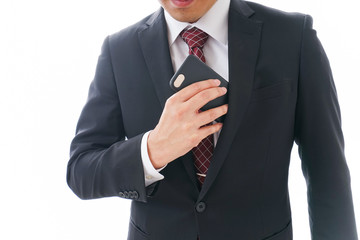 スマホを使うビジネスマン