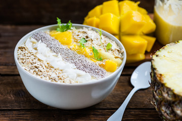 Mango, Banana, Pineapple and Oatmeal Smoothie in the Bowl