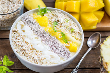 Mango, Banana, Pineapple and Oatmeal Smoothie in the Bowl