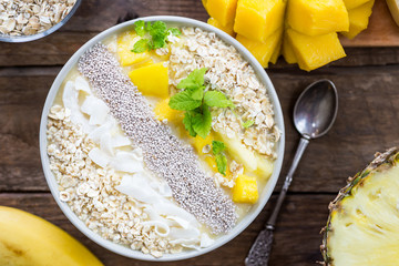 Mango, Banana, Pineapple and Oatmeal Smoothie in the Bowl