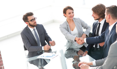 handshake business women with business partner