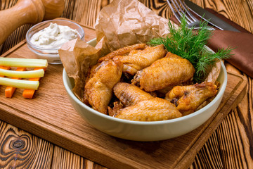 Chicken wings with blue cheese sauce