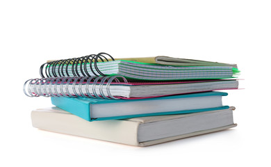 Stack of notebooks and books on white background. Doing homework