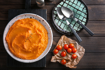 Composition with tasty mashed sweet potato on table, top view