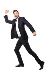 Young businessman running on white background