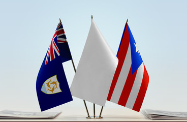 Flags of Anguilla and Puerto Rico with a white flag in the middle
