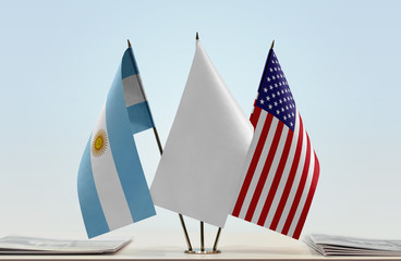 Flags of Argentina and USA with a white flag in the middle