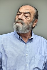 Obraz premium Portrait Of A Bearded Old Male