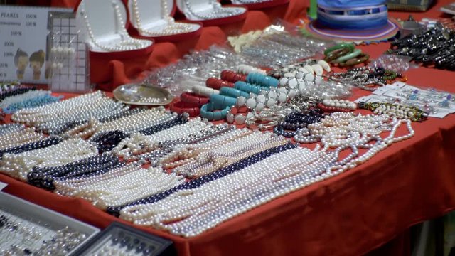 Pearl necklaces and souvenirs at the Jomtien night market. Thailand. Pattaya.