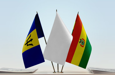 Flags of Barbados and Bolivia with a white flag in the middle