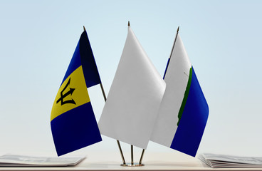 Flags of Barbados and Navassa Island with a white flag in the middle