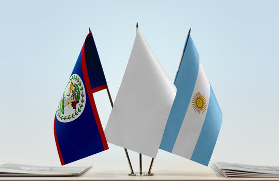 Flags of Belize and Argentina with a white flag in the middle