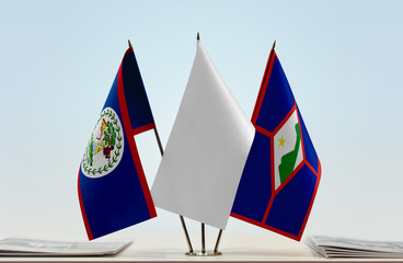 Flags of Belize and Sint Eustatius with a white flag in the middle