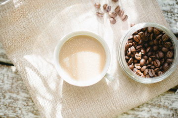 A cup of coffee in the morning sun.