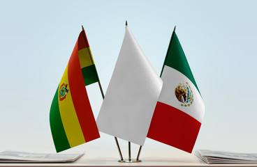 Flags of Bolivia and Mexico with a white flag in the middle