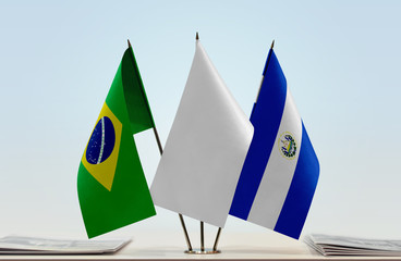 Flags of Brazil and El Salvador with a white flag in the middle