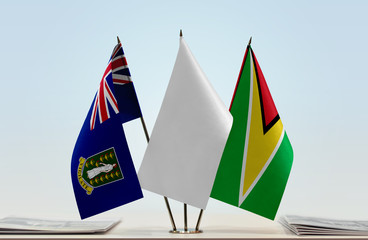 Flags of British Virgin Islands and Guyana with a white flag in the middle