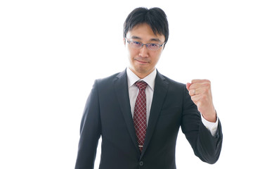 ガッツポーズをするビジネスマン