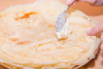 Stuffed pancakes. Pancakes with cottage cheese. Cooking pancakes. Wrap up the pancakes with cottage cheese.
