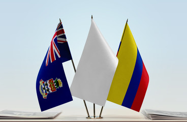 Flags of Cayman Islands and Colombia with a white flag in the middle