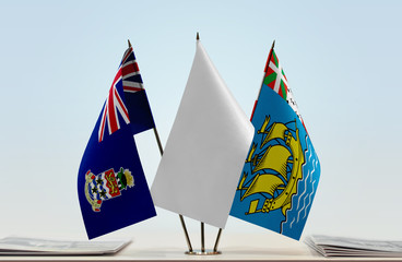 Flags of Cayman Islands and Saint Pierre and Miquelon with a white flag in the middle