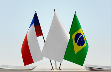 Flags of Chile and Brazil with a white flag in the middle