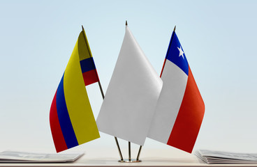 Fototapeta premium Flags of Colombia and Chile with a white flag in the middle