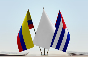 Flags of Colombia and Cuba with a white flag in the middle