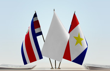 Flags of Costa Rica and Saba with a white flag in the middle