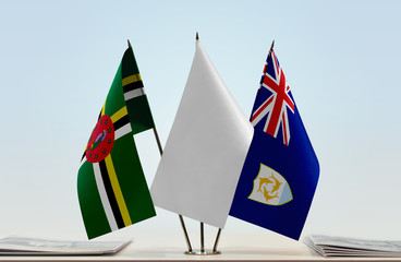 Flags of Dominica and Anguilla with a white flag in the middle