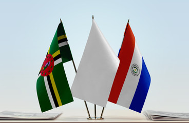 Flags of Dominica and Paraguay with a white flag in the middle