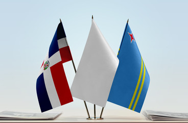 Flags of Dominican Republic and Aruba with a white flag in the middle
