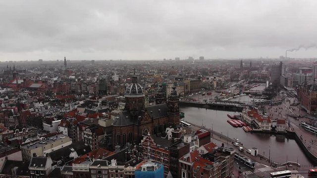Amsterdam from above including the Sint-Nicolaaskerk and the Central Station.