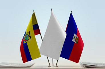 Flags of Ecuador and Haiti with a white flag in the middle